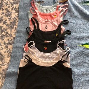 5 medium crop tanks from Victoria secret and 3  from Pink